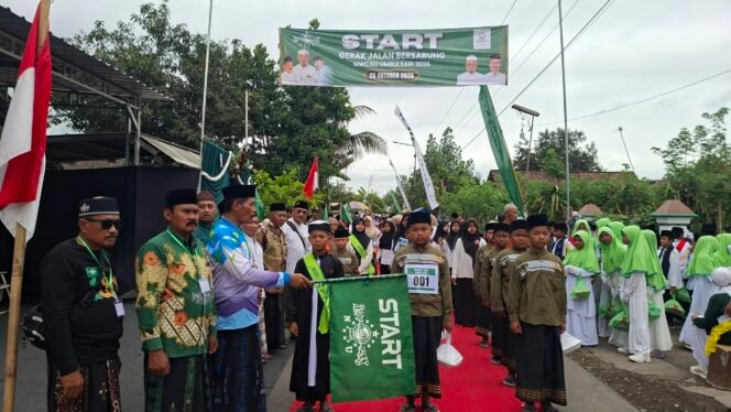 
					Semarak Hari Santri Nasional 2026, MWCNU Umbulsari Gelar Gerak Jalan Bersarung, Diikuti 135 Regu